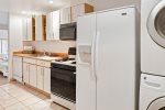There is a well-equipped kitchenette with a wash and dryer for your convenience